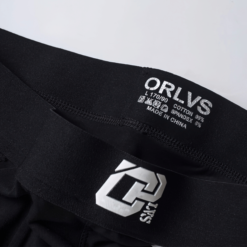 Close-up of black stylish men's sports boxers, featuring soft fabric and elastic waistband, perfect for comfort and style.